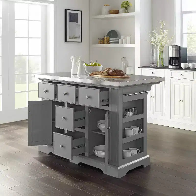 Îlot de cuisine avec plateau en acier inoxydable