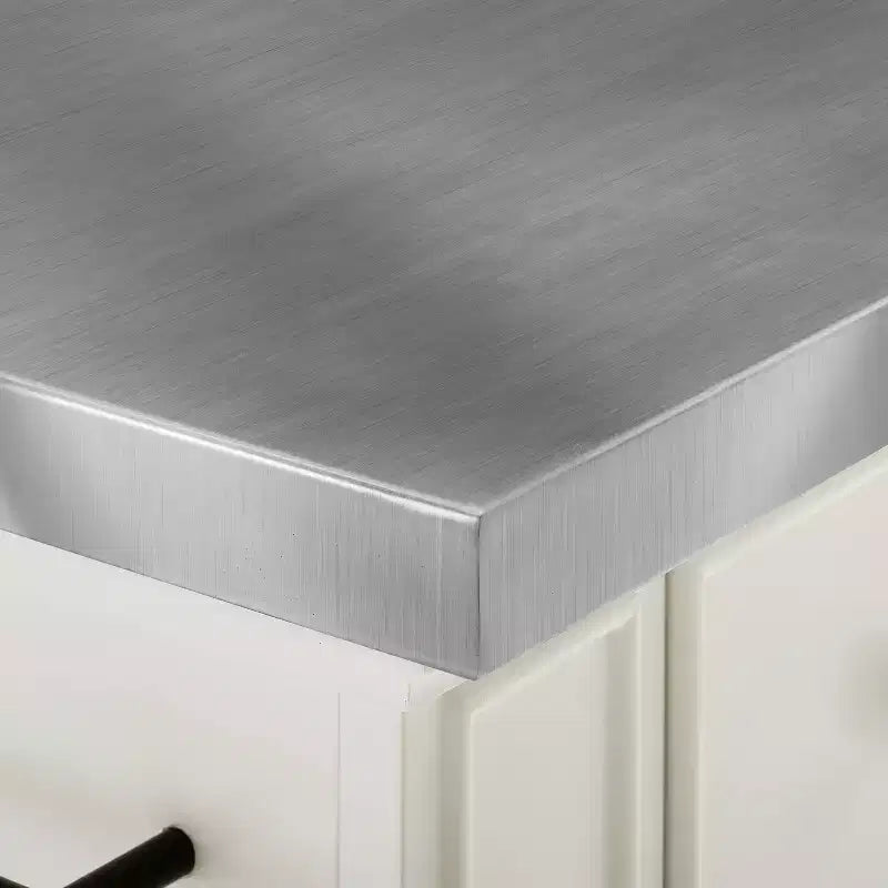Îlot de cuisine avec plateau en acier inoxydable