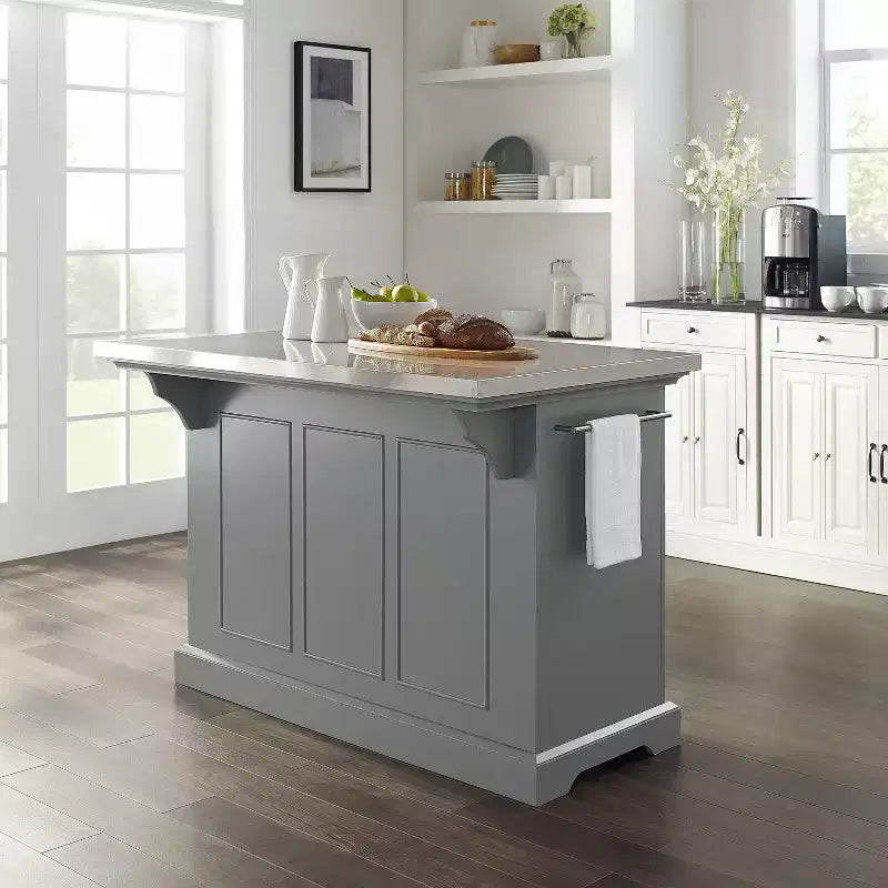 Îlot de cuisine avec plateau en acier inoxydable
