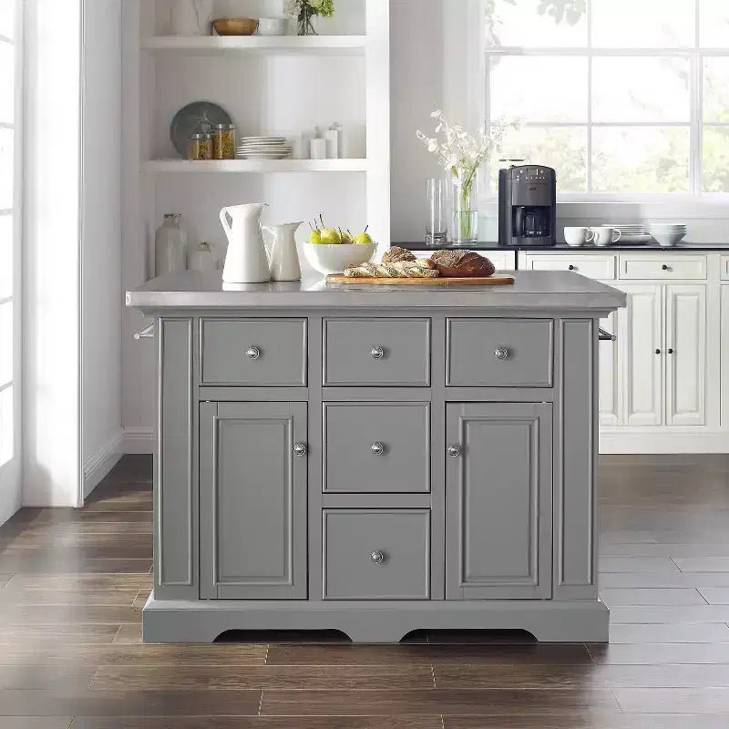 Îlot de cuisine avec plateau en acier inoxydable